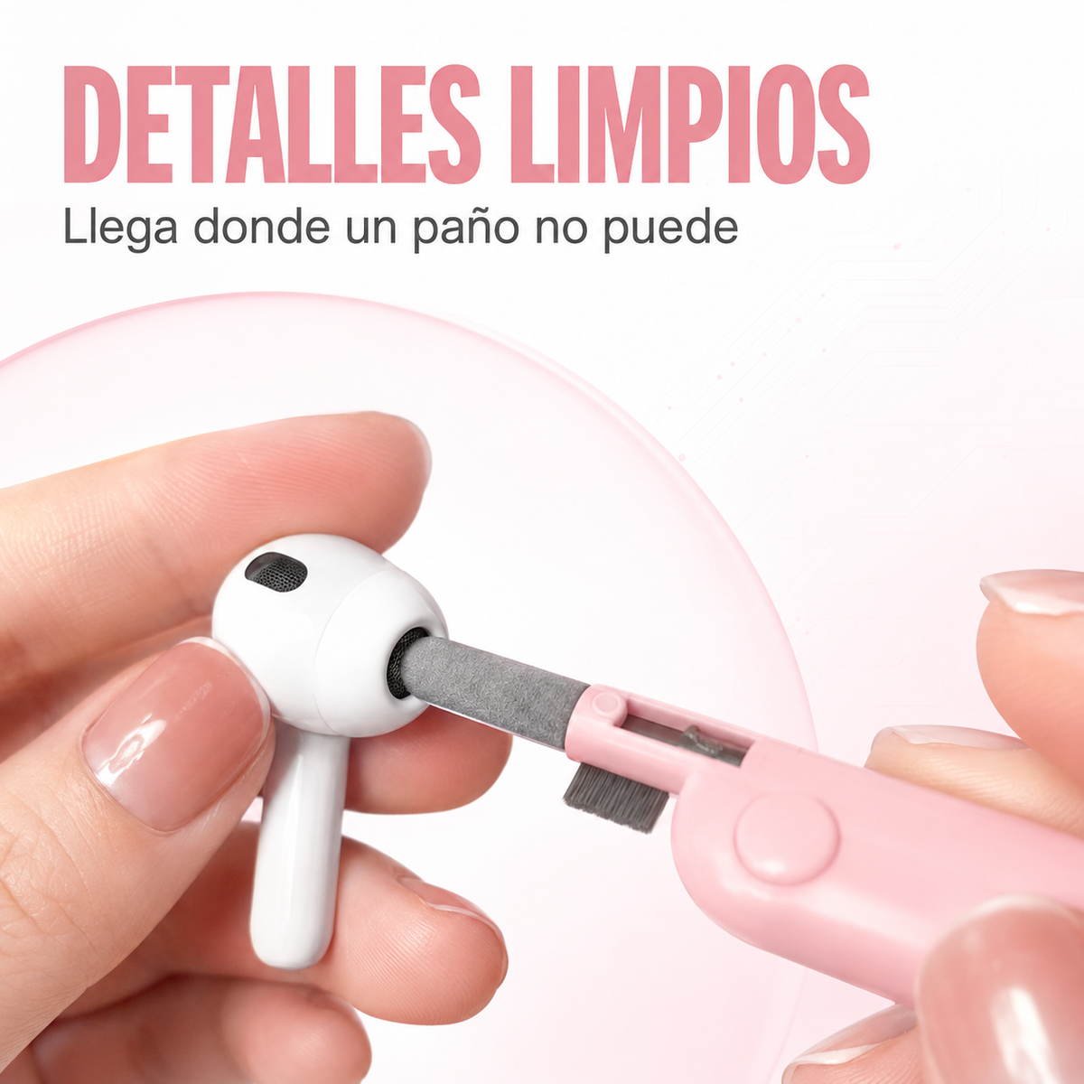 Herramienta rosada del kit limpiando la malla de un audífono inalámbrico
